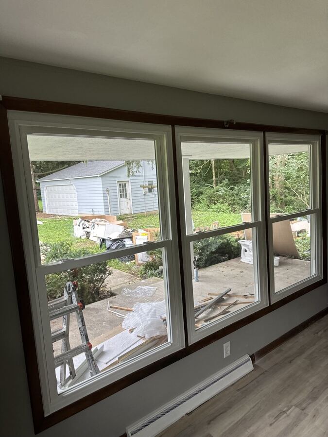 Interior view of new windows with the original wood trim preserved